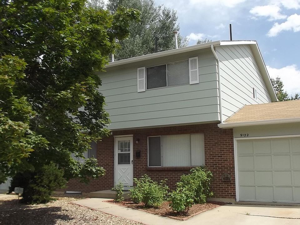 9122 Perry Street - 1/2 Duplex with One Car Attached Garage - Rose Bushes and Low Maintenance Front Yard
