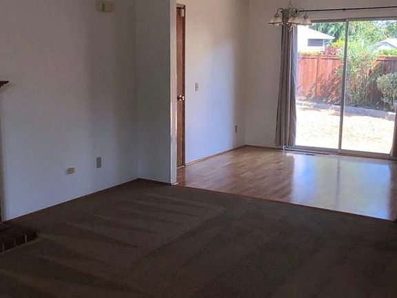 Dining area with sliding door to backyard