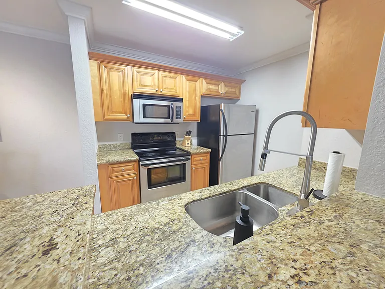 8926 Manor Loop #102 — Photo 63