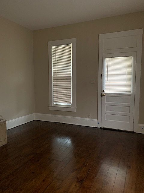 View looking toward front door and front room.