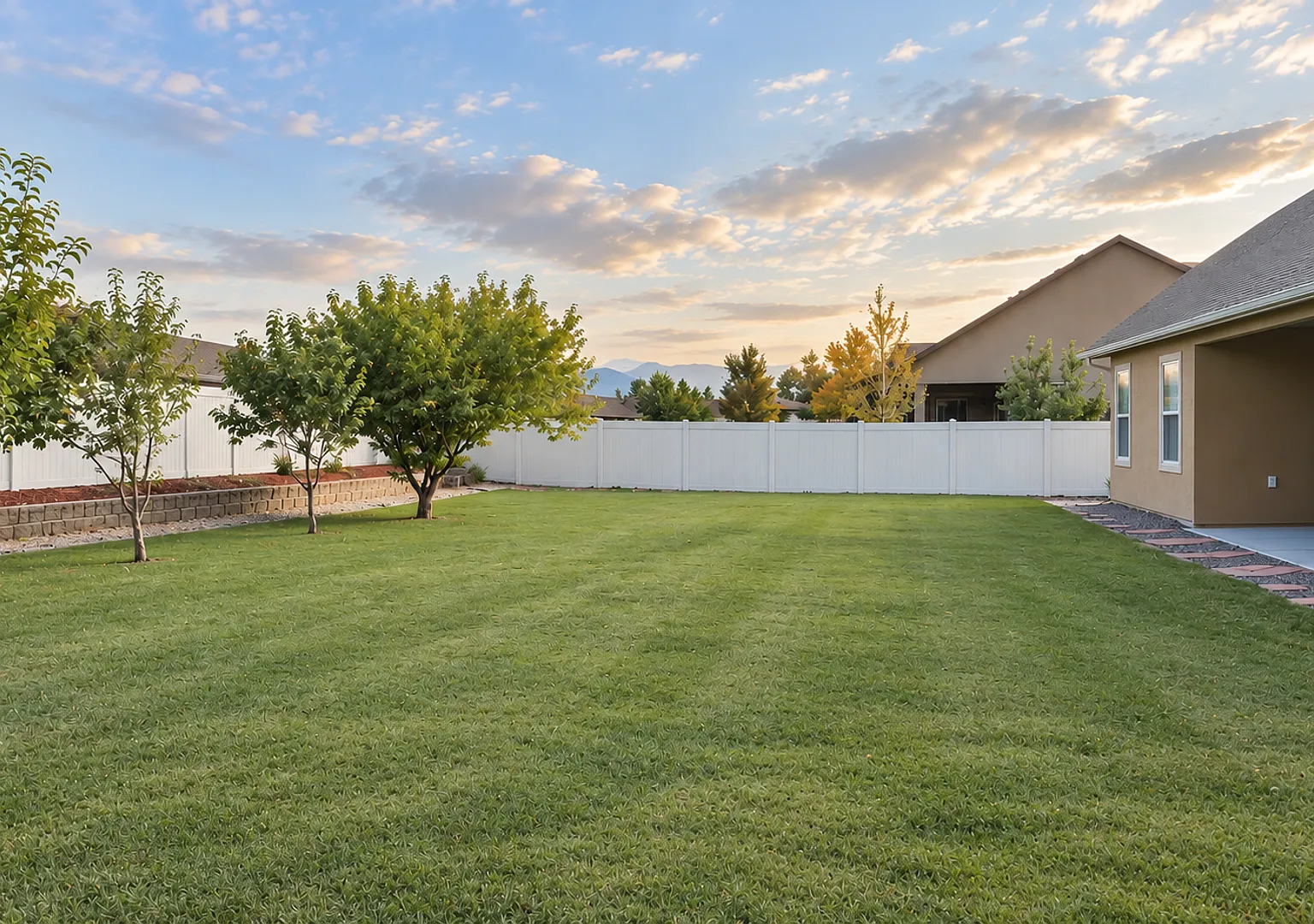 Spacious 5-Bedroom Home with Oversized Garage & Fenced Yard! — Photo 3