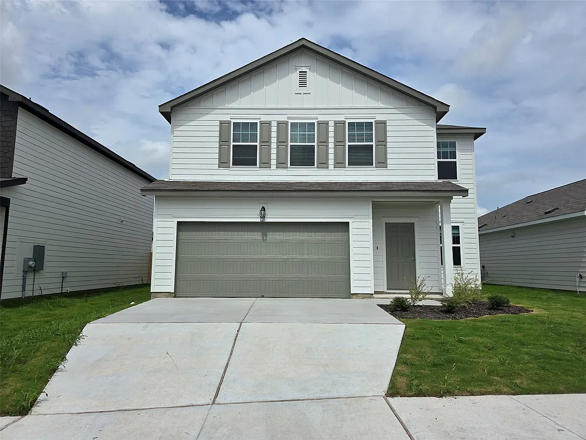 Front view of 121 Blazilmar LN, Taylor, TX 76574