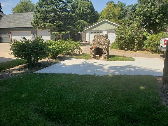 Fire pit/ out door fireplace next to off street parking.