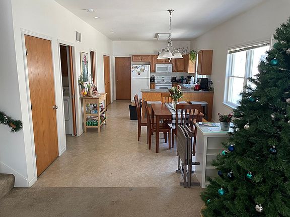 View of dining room and kitchen from living room.