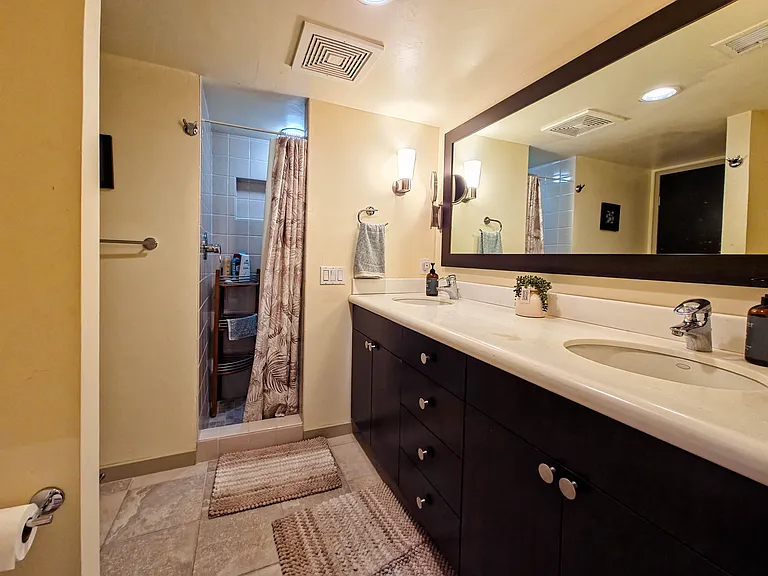 Secondary bathroom with walk-in shower.