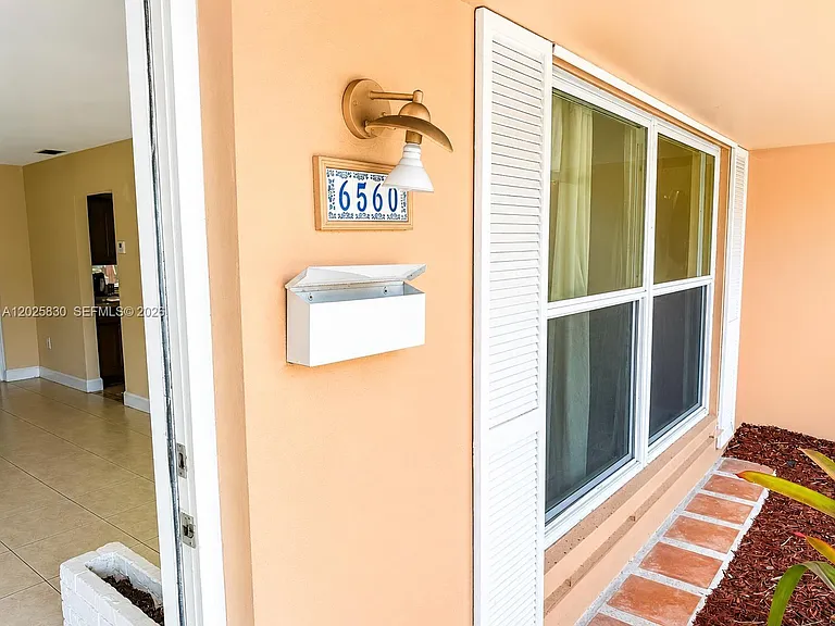 6560 NW 25th Ct — Photo 2