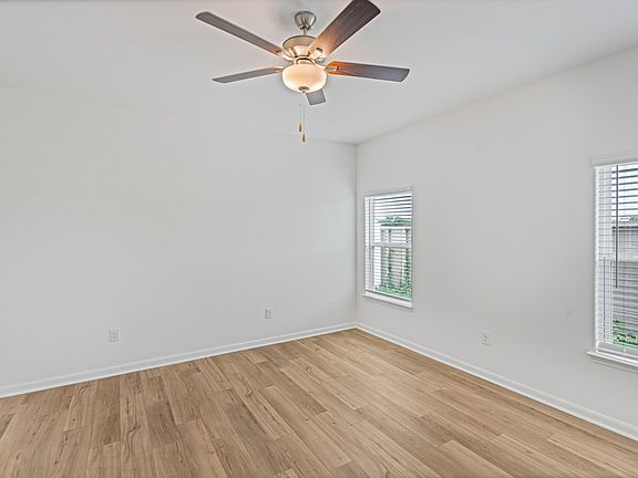 Master bedroom with double windows to allow a light and open space.