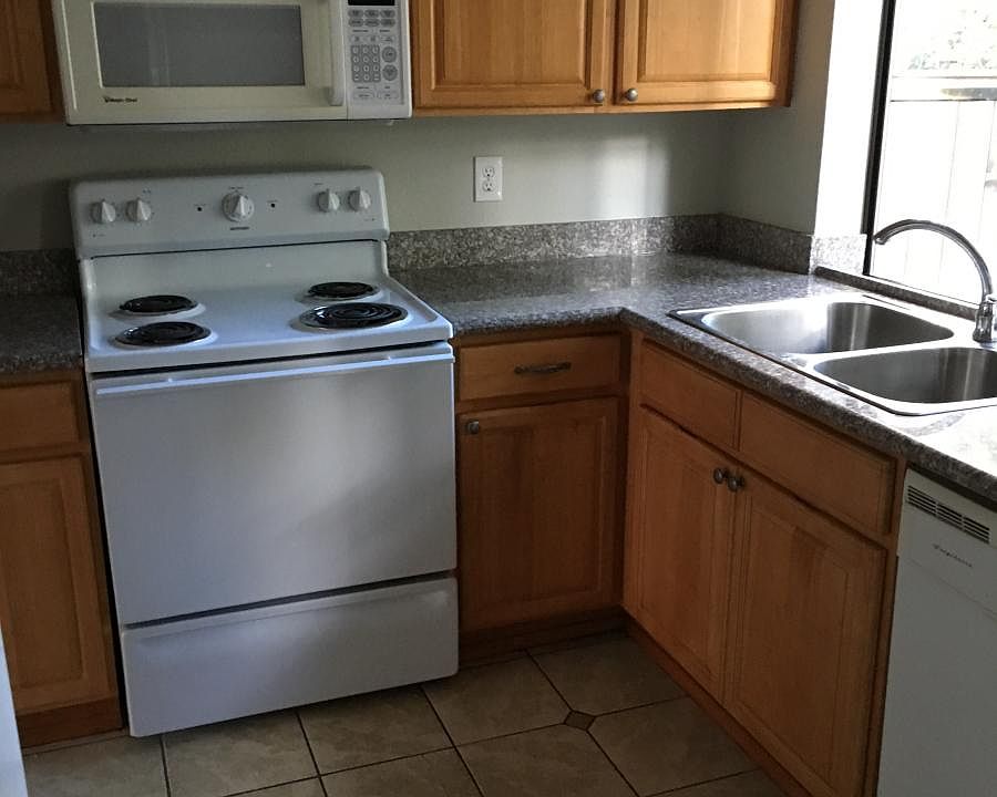 Microwave, Granite counter tops, tile floors
