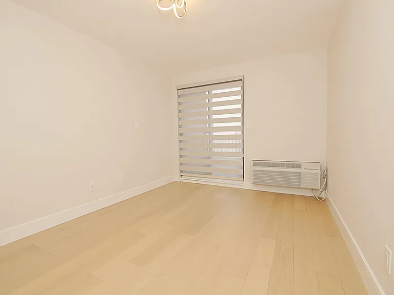 First bedroom with terrace with city views.
