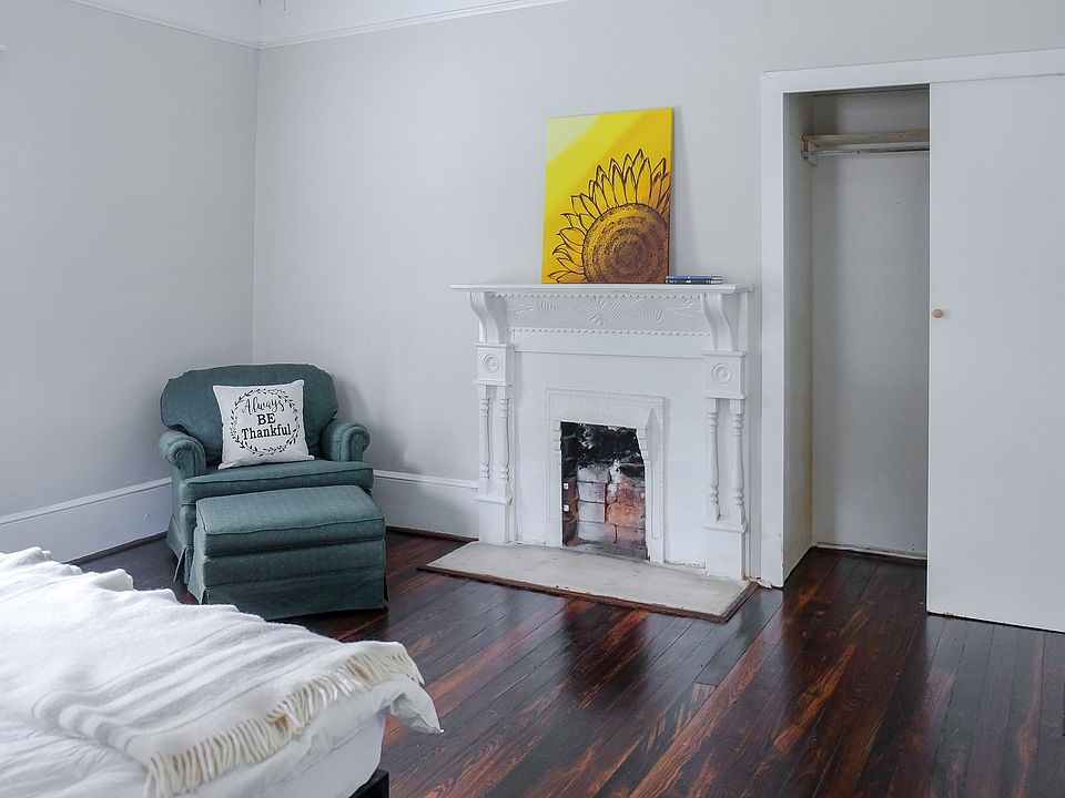 Spacious bedroom with homey accents