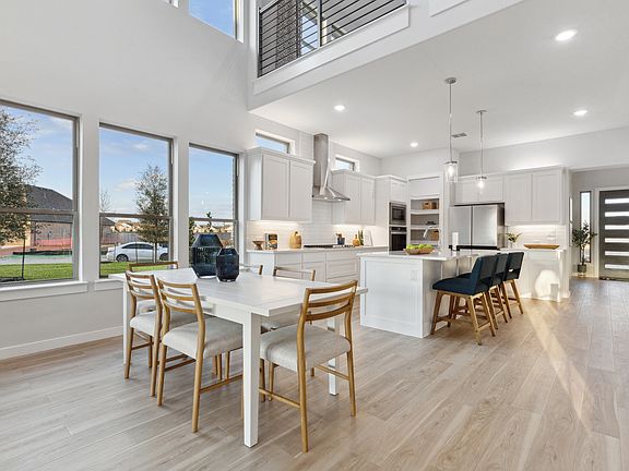 Dining Room in the Monet II home plan by Trophy Signature Homes - REPRESENTATIVE PHOTO