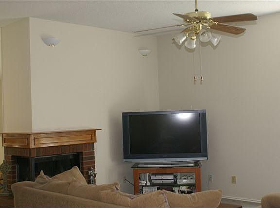 DEN WITH CORNER FIREPLACE