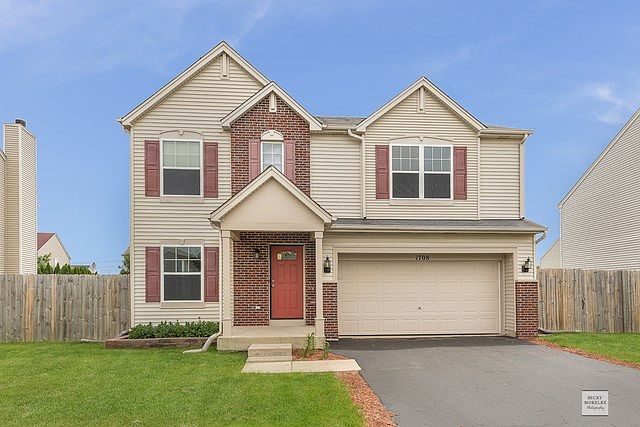 Exterior Front ~ Driveway seal coated