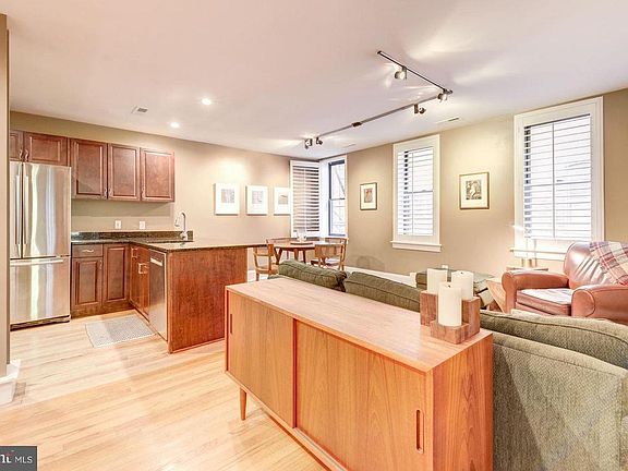 View of kitchen/living area from entrance foyer.