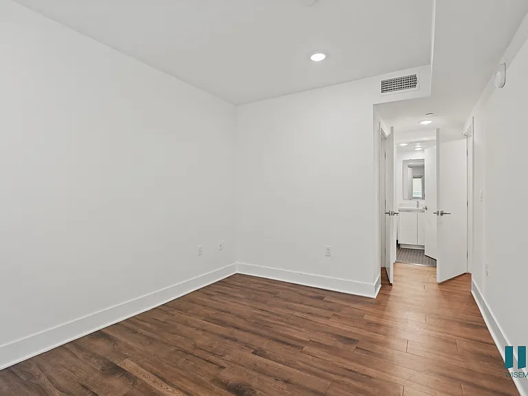 Bedroom with Walk-In Closet and Bathroom