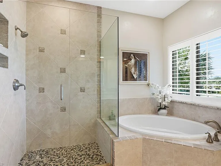 7048 Pelican Bay Blvd #C-302 — Photo 22