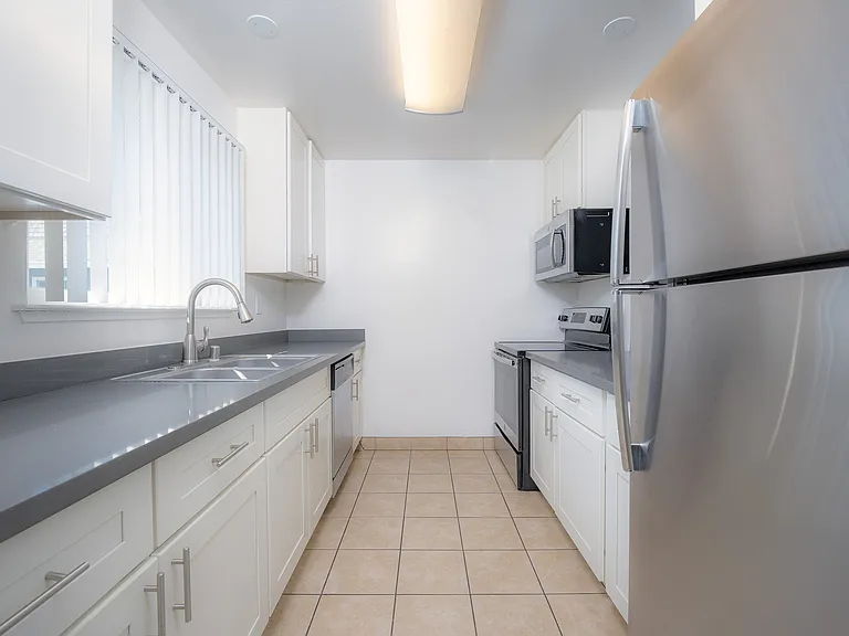 Step into this beautifully designed kitchen, offering functionality and style.