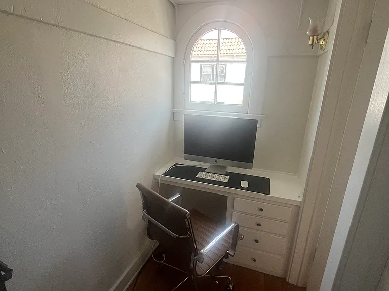 Walk in closet with built in desk
