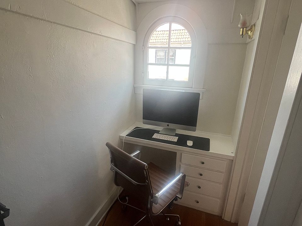 Walk in closet with built in desk