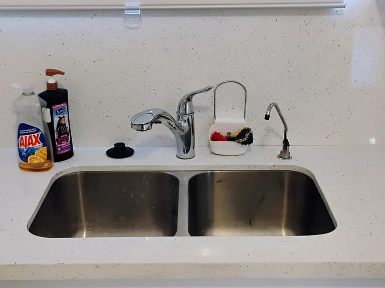 Kitchen - large and deep double bowl kitchen sink.