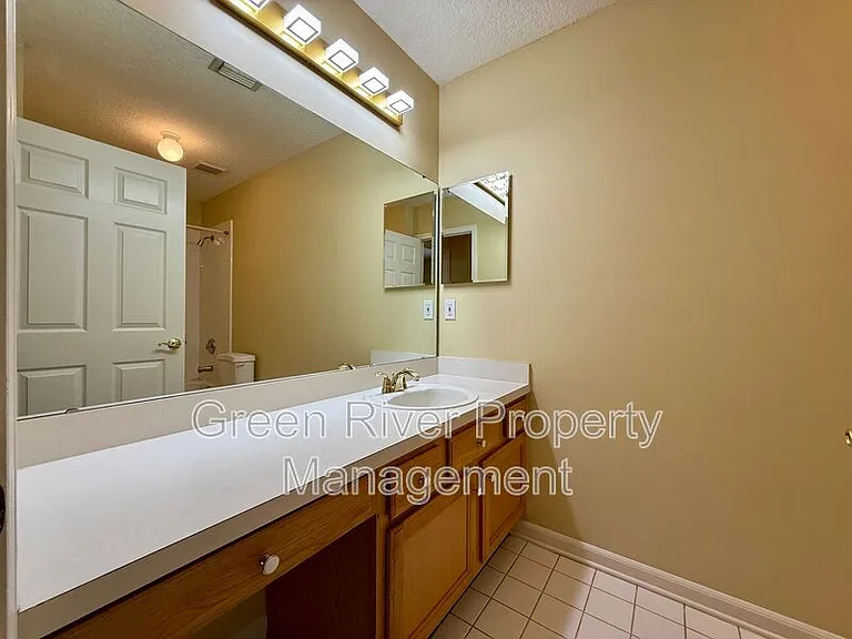 8716 Canopy Oaks Dr — Photo 41