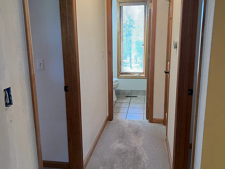 Upstairs hallway to two bedrooms and bathroom!