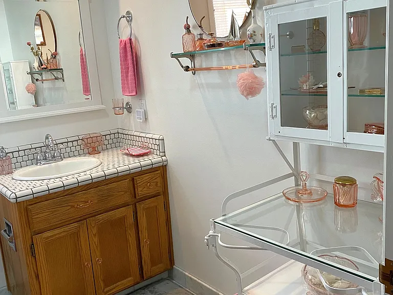 Hall Bath o/natural Carrera Marble Floor w/Soap, Shampoo, Conditioner, Hair Dryer, & Vintage Pink DG