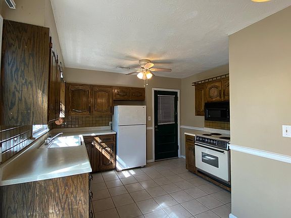 New Dishwasher and new kitchen light fixtures were just installed updated pictures to come, Refrigerator in picture is not included but a refrigerator CAN be included in the price.