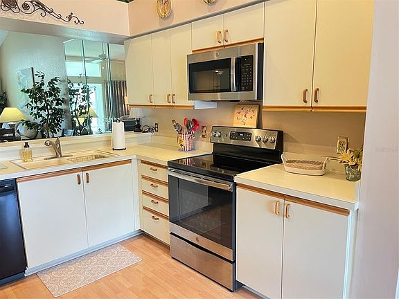 4th image of 6713 STONE RIVER RD #203