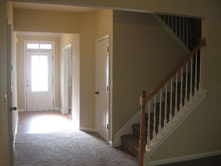 front hall fresh carpet up stairs and bedrooms