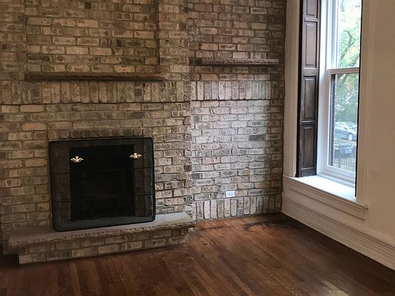 Front Room with wood burning fireplace