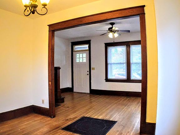 Front door, living room, and dining room