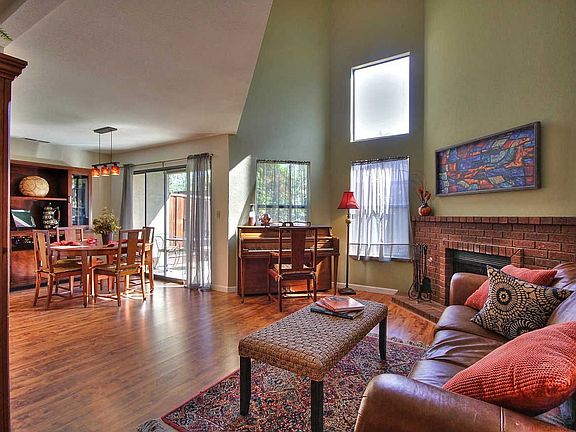Cozy Brick Fireplace in Living Room