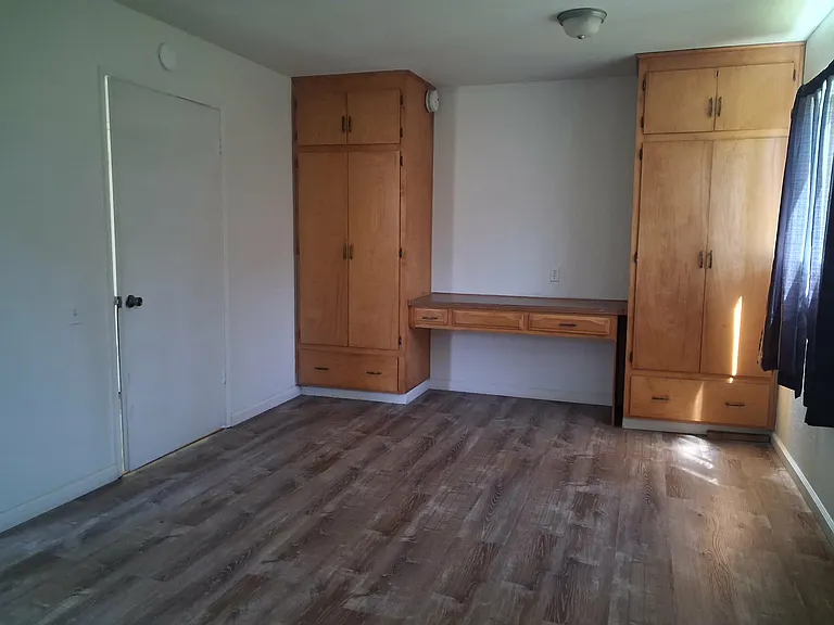 Rear bedroom with built-ins