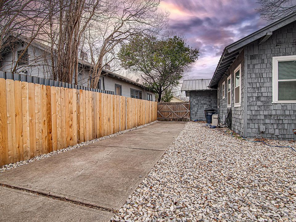 View of driveway leading from Unit C to the front of the property.