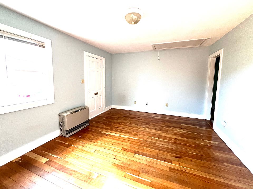 Light-filled living room with propane heat.