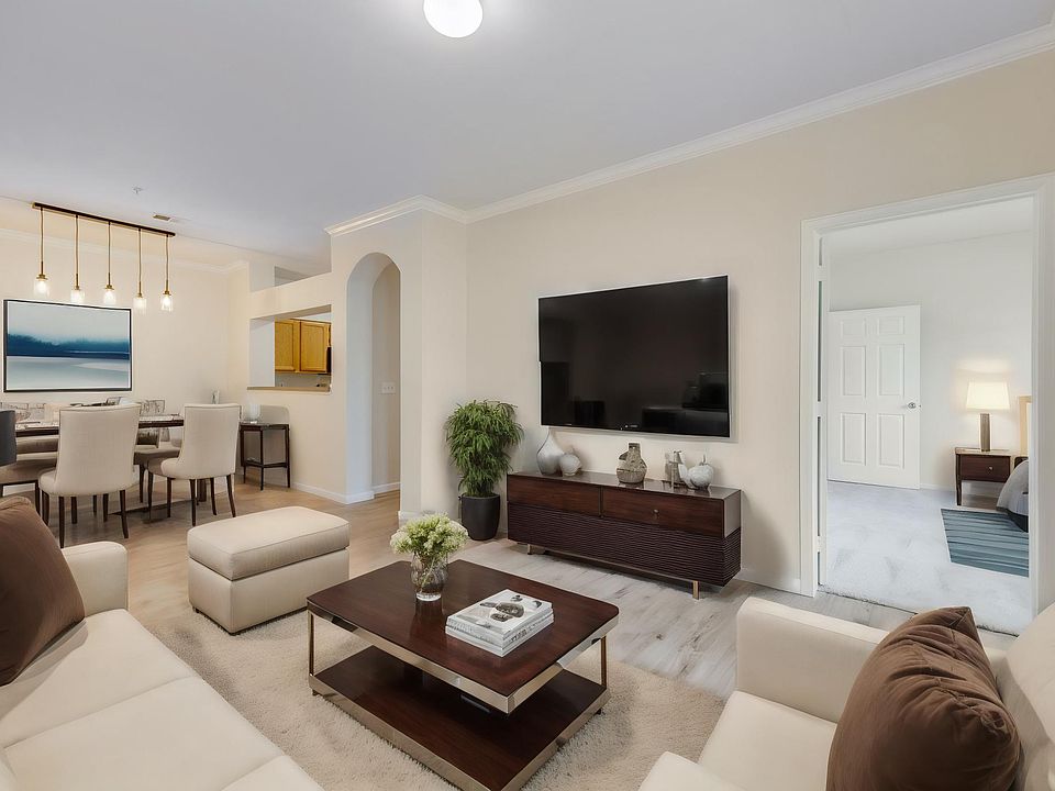 Living room and dining room (virtually staged)
