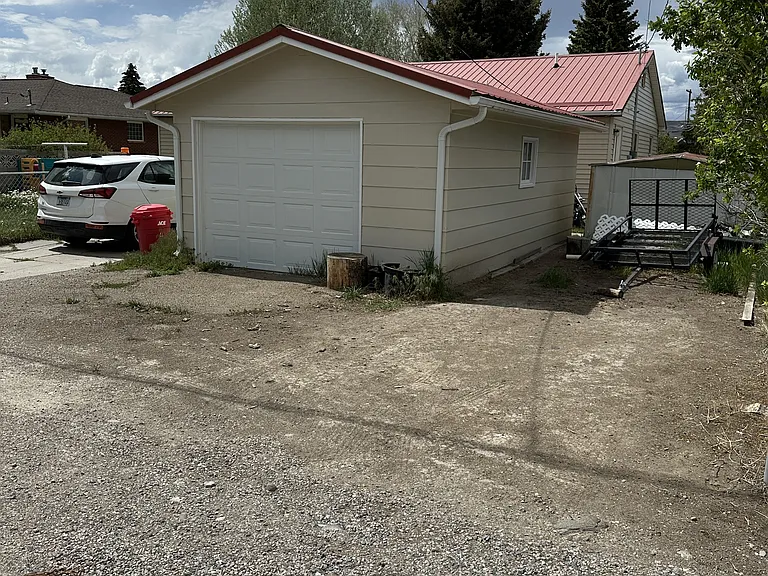 Back garage and parking spot.