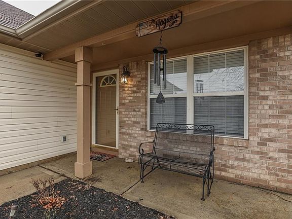 This Covered Porch is Great to Welcome Guests or Drink Morning Coffee
