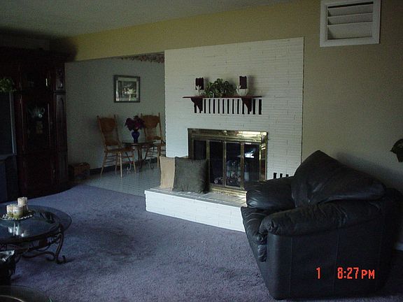 Living room with wood fireplace