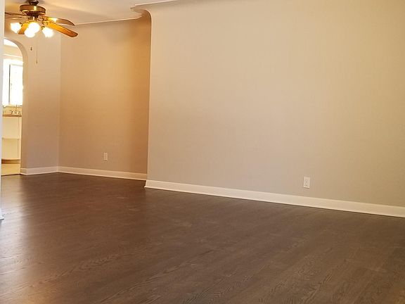 Living room, dining nook, entry to kitchen