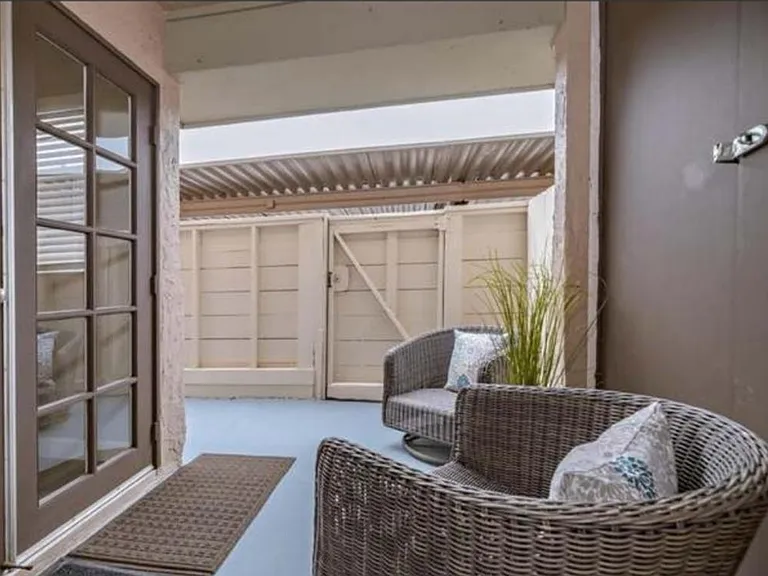 Patio ... open gate to access your covered parking space