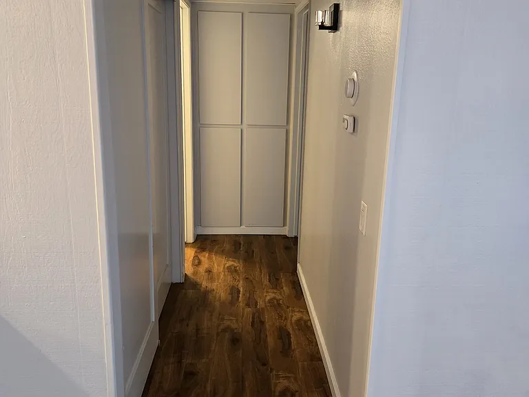 Hall to 2nd bed & bath has long closet on the left