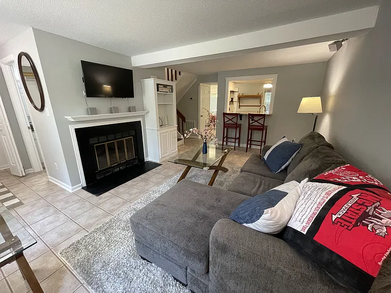 Living Room with working real-wood fireplace