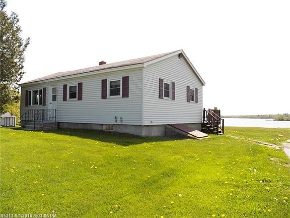 Spacious Waterfront Ranch with a wide open view of Stockton Harbor.  Enjoy gorgeous sunsets from your family room.