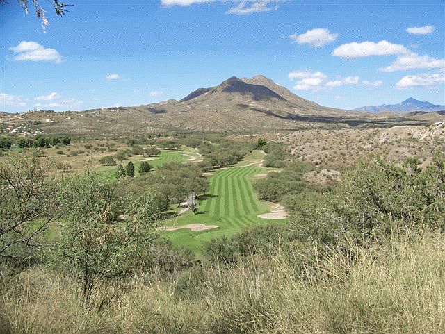View from backyard looking down onto 16th green