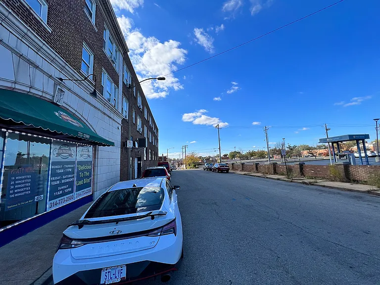 Free on-street parking on Tholozan Avenue next to building.