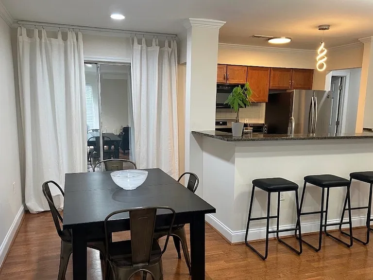 Bar seating, porch access off kitchen.