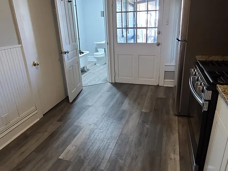Spacious kitchen with new cabinets & granite counter and stainless steel appliances