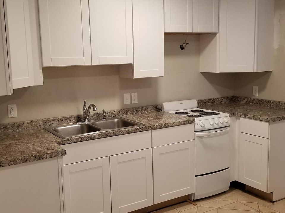 Kitchen from Apt B but looks similar and does include a hood vent